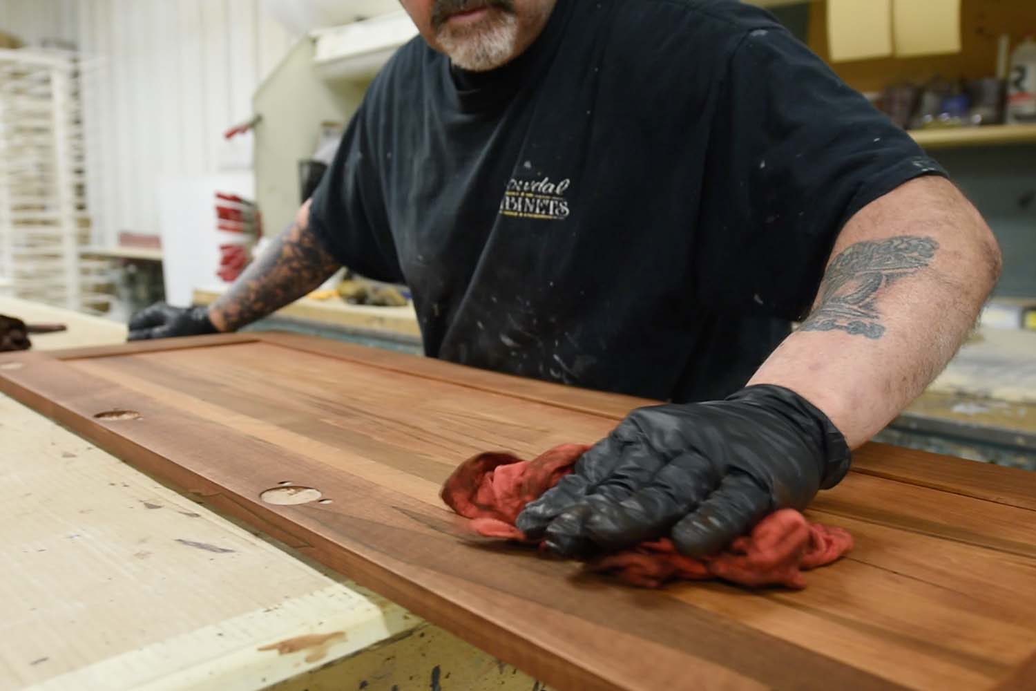 Workshop at Dowdal Cabinets - finishing cabinet door